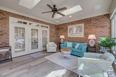 Beautifully crafted brick home situated in the Ashwood on Cape Fear National At Brunswick Forest in North Carolina - for sale on GolfHomes.com, golf home, golf lot