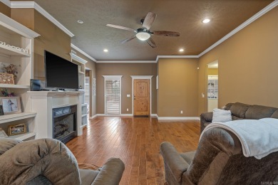 Discover refined living in this stunning 4-bedroom, 3-bath home on The Course At Eagle Mountain in Arkansas - for sale on GolfHomes.com, golf home, golf lot