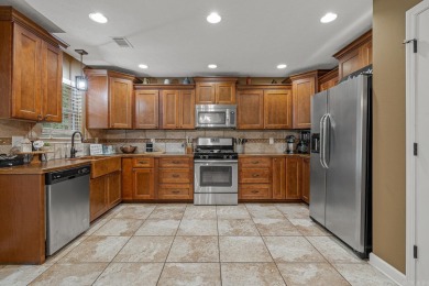 Discover refined living in this stunning 4-bedroom, 3-bath home on The Course At Eagle Mountain in Arkansas - for sale on GolfHomes.com, golf home, golf lot
