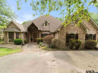 Beautiful custom golf course home in the private gated community on Holly Lake Ranch Golf Club in Texas - for sale on GolfHomes.com, golf home, golf lot