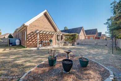 Beautifully crafted brick home situated in the Ashwood on Cape Fear National At Brunswick Forest in North Carolina - for sale on GolfHomes.com, golf home, golf lot