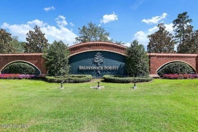 Beautifully crafted brick home situated in the Ashwood on Cape Fear National At Brunswick Forest in North Carolina - for sale on GolfHomes.com, golf home, golf lot