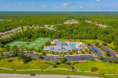 Beautifully crafted brick home situated in the Ashwood on Cape Fear National At Brunswick Forest in North Carolina - for sale on GolfHomes.com, golf home, golf lot