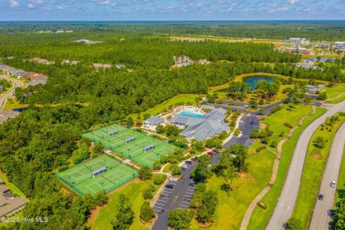 Beautifully crafted brick home situated in the Ashwood on Cape Fear National At Brunswick Forest in North Carolina - for sale on GolfHomes.com, golf home, golf lot