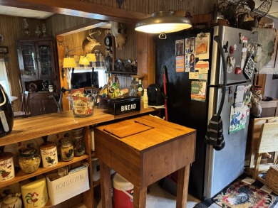 If you are looking for a cozy home or up north retreat look no on Garland Resort and Golf Club  in Michigan - for sale on GolfHomes.com, golf home, golf lot