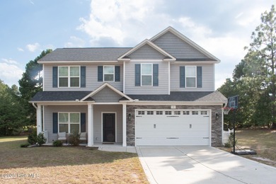 *PRICE REDUCED $435,000* Welcome to this beautiful 4-bedroom, 2 on Foxfire Golf and Country Club in North Carolina - for sale on GolfHomes.com, golf home, golf lot
