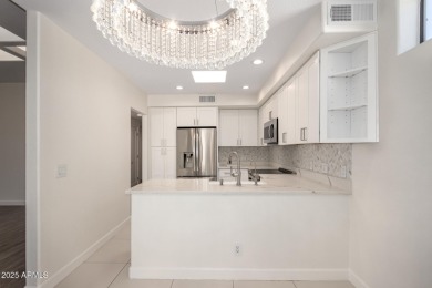 This beautiful 2-bedroom townhome in the exclusive Oasis at on Gainey Ranch Golf Club in Arizona - for sale on GolfHomes.com, golf home, golf lot