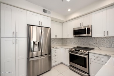 This beautiful 2-bedroom townhome in the exclusive Oasis at on Gainey Ranch Golf Club in Arizona - for sale on GolfHomes.com, golf home, golf lot
