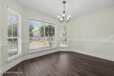 This cozy Diamondhead gem has been beautifully renovated and is on Diamondhead Country Club in Mississippi - for sale on GolfHomes.com, golf home, golf lot