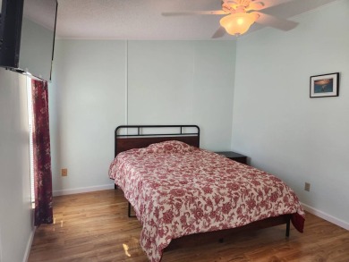 This appealing home is priced to sell. Offering tremendous value on The Club At Pointe West in Florida - for sale on GolfHomes.com, golf home, golf lot