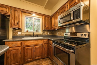 Discover your own slice of paradise with this secluded home on Mountain Ranch Golf Club in Arkansas - for sale on GolfHomes.com, golf home, golf lot