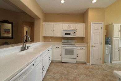Sought after concrete block and stucco Sanibel located on the on Eagle Ridge At Spruce Creek Country Club in Florida - for sale on GolfHomes.com, golf home, golf lot