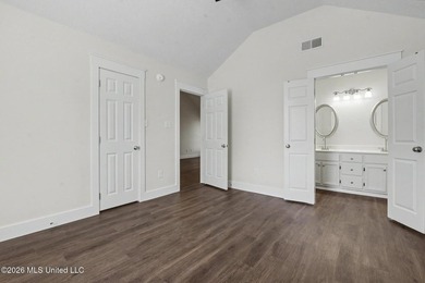 This cozy Diamondhead gem has been beautifully renovated and is on Diamondhead Country Club in Mississippi - for sale on GolfHomes.com, golf home, golf lot