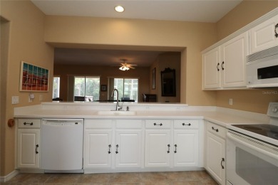 Sought after concrete block and stucco Sanibel located on the on Eagle Ridge At Spruce Creek Country Club in Florida - for sale on GolfHomes.com, golf home, golf lot