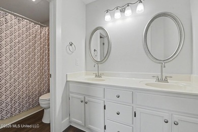 This cozy Diamondhead gem has been beautifully renovated and is on Diamondhead Country Club in Mississippi - for sale on GolfHomes.com, golf home, golf lot