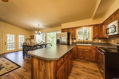 Discover your own slice of paradise with this secluded home on Mountain Ranch Golf Club in Arkansas - for sale on GolfHomes.com, golf home, golf lot