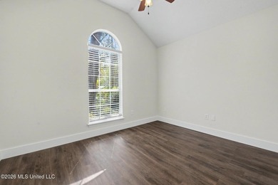 This cozy Diamondhead gem has been beautifully renovated and is on Diamondhead Country Club in Mississippi - for sale on GolfHomes.com, golf home, golf lot