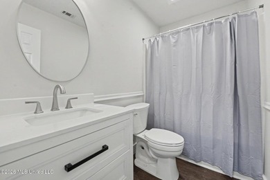 This cozy Diamondhead gem has been beautifully renovated and is on Diamondhead Country Club in Mississippi - for sale on GolfHomes.com, golf home, golf lot