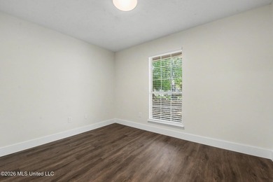 This cozy Diamondhead gem has been beautifully renovated and is on Diamondhead Country Club in Mississippi - for sale on GolfHomes.com, golf home, golf lot