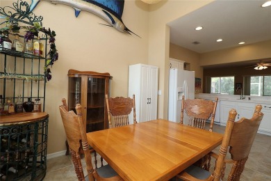 Sought after concrete block and stucco Sanibel located on the on Eagle Ridge At Spruce Creek Country Club in Florida - for sale on GolfHomes.com, golf home, golf lot