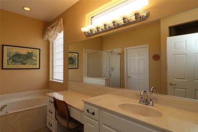 Sought after concrete block and stucco Sanibel located on the on Eagle Ridge At Spruce Creek Country Club in Florida - for sale on GolfHomes.com, golf home, golf lot