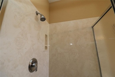 Sought after concrete block and stucco Sanibel located on the on Eagle Ridge At Spruce Creek Country Club in Florida - for sale on GolfHomes.com, golf home, golf lot