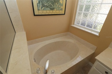 Sought after concrete block and stucco Sanibel located on the on Eagle Ridge At Spruce Creek Country Club in Florida - for sale on GolfHomes.com, golf home, golf lot