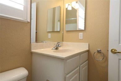Sought after concrete block and stucco Sanibel located on the on Eagle Ridge At Spruce Creek Country Club in Florida - for sale on GolfHomes.com, golf home, golf lot