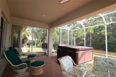 Sought after concrete block and stucco Sanibel located on the on Eagle Ridge At Spruce Creek Country Club in Florida - for sale on GolfHomes.com, golf home, golf lot