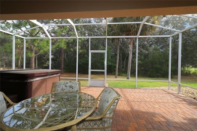 Sought after concrete block and stucco Sanibel located on the on Eagle Ridge At Spruce Creek Country Club in Florida - for sale on GolfHomes.com, golf home, golf lot