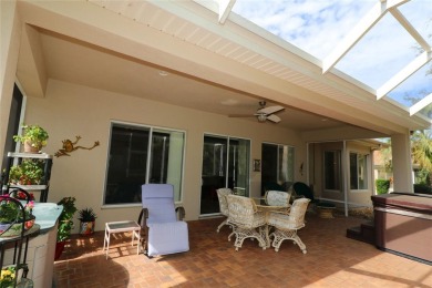 Sought after concrete block and stucco Sanibel located on the on Eagle Ridge At Spruce Creek Country Club in Florida - for sale on GolfHomes.com, golf home, golf lot
