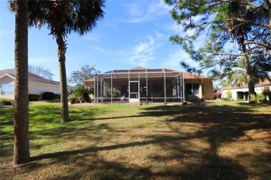 Sought after concrete block and stucco Sanibel located on the on Eagle Ridge At Spruce Creek Country Club in Florida - for sale on GolfHomes.com, golf home, golf lot