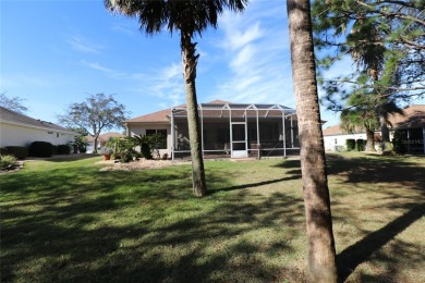 Sought after concrete block and stucco Sanibel located on the on Eagle Ridge At Spruce Creek Country Club in Florida - for sale on GolfHomes.com, golf home, golf lot