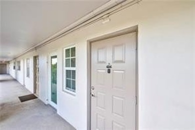 Experience turnkey luxury in this completely redesigned on Palm-Aire Country Club and Resort - The Oaks in Florida - for sale on GolfHomes.com, golf home, golf lot