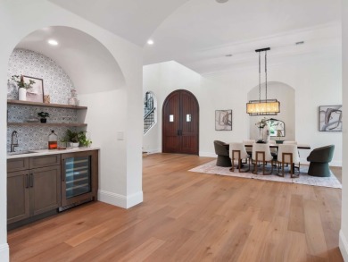 One or more photo(s) has been virtually staged. Nestled along on Lake Nona Golf Club, Inc. in Florida - for sale on GolfHomes.com, golf home, golf lot