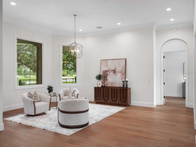 One or more photo(s) has been virtually staged. Nestled along on Lake Nona Golf Club, Inc. in Florida - for sale on GolfHomes.com, golf home, golf lot