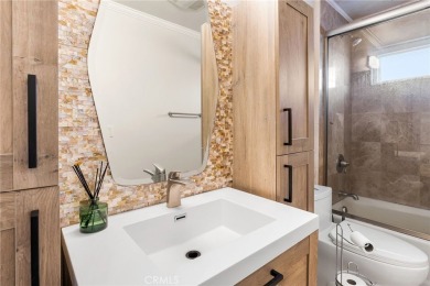 Welcome to 22883 Calcutta Drive, an exquisite retreat nestled on on Canyon Lake Country Club in California - for sale on GolfHomes.com, golf home, golf lot