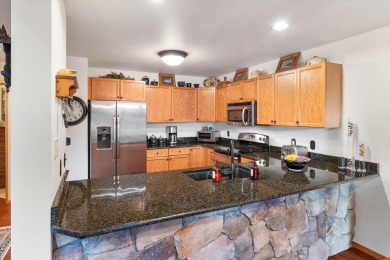 Indulge in upscale living with this beautifully updated two on Meadow Lake Golf Resort in Montana - for sale on GolfHomes.com, golf home, golf lot