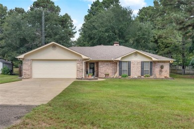 Impeccably maintained and beautifully updated home located in on Holly Lake Ranch Golf Club in Texas - for sale on GolfHomes.com, golf home, golf lot