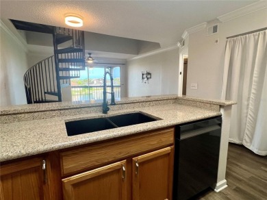 HIGH  DRY 2BR/1BA 3RD FLOOR Condo with detached garage and on Feather Sound Country Club in Florida - for sale on GolfHomes.com, golf home, golf lot