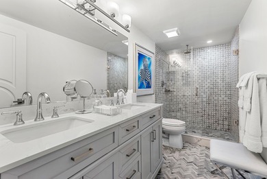 Experience coastal living at its finest in this fully updated on Palm Beach Par-3 Golf Course in Florida - for sale on GolfHomes.com, golf home, golf lot