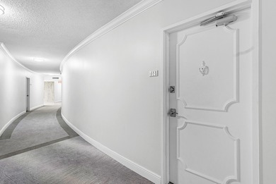 Experience coastal living at its finest in this fully updated on Palm Beach Par-3 Golf Course in Florida - for sale on GolfHomes.com, golf home, golf lot