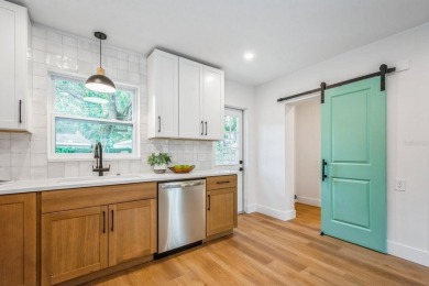 This fully remodeled 2 bedroom, 1.5 bathroom single story home on The Dunedin Country Club in Florida - for sale on GolfHomes.com, golf home, golf lot