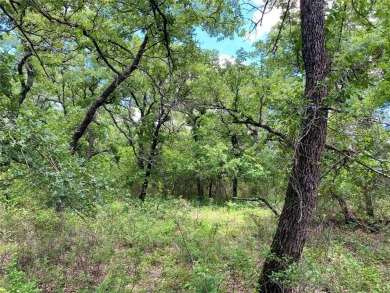 Fantastic 1.5 acre corner lot in the private gated community of on Nocona Hills Golf Course in Texas - for sale on GolfHomes.com, golf home, golf lot
