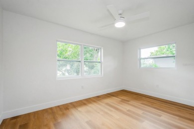 This fully remodeled 2 bedroom, 1.5 bathroom single story home on The Dunedin Country Club in Florida - for sale on GolfHomes.com, golf home, golf lot
