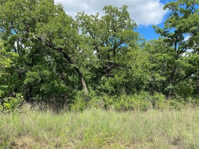 Fantastic 1.5 acre corner lot in the private gated community of on Nocona Hills Golf Course in Texas - for sale on GolfHomes.com, golf home, golf lot
