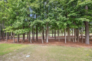 Nestled along the 11th green of the Norman Golf Course in the on Barefoot Resort and Golf Club  in South Carolina - for sale on GolfHomes.com, golf home, golf lot