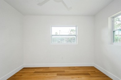 This fully remodeled 2 bedroom, 1.5 bathroom single story home on The Dunedin Country Club in Florida - for sale on GolfHomes.com, golf home, golf lot
