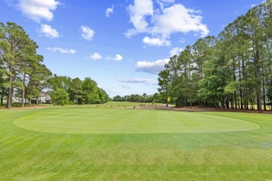 Nestled along the 11th green of the Norman Golf Course in the on Barefoot Resort and Golf Club  in South Carolina - for sale on GolfHomes.com, golf home, golf lot