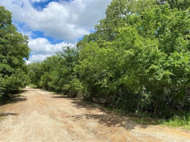 Fantastic 1.5 acre corner lot in the private gated community of on Nocona Hills Golf Course in Texas - for sale on GolfHomes.com, golf home, golf lot